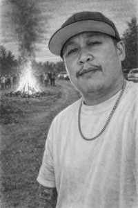 Ghost of the novel Street Ohana standing near a bonfire in Stockton